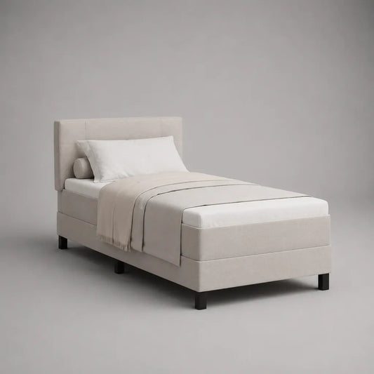 Lit simple rembourré rectangulaire en tissu blanc cassé avec tête de lit et pieds noirs, couchage 90 × 190 cm, dimensions 203 × 99 × 110 cm